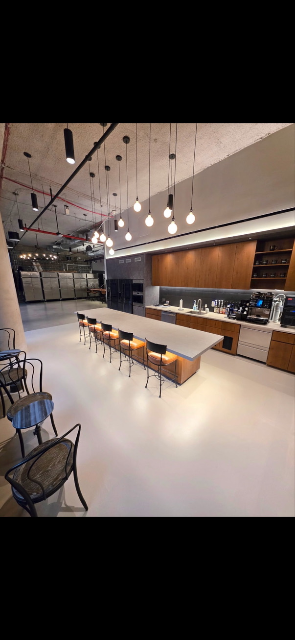 Epoxy flooring in modern cafe and kitchen space